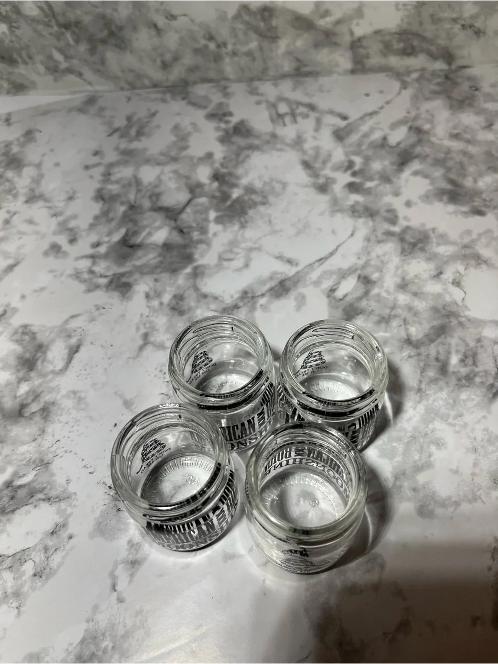 Set of 4 Clear Glass Shot Jars with Black Logo